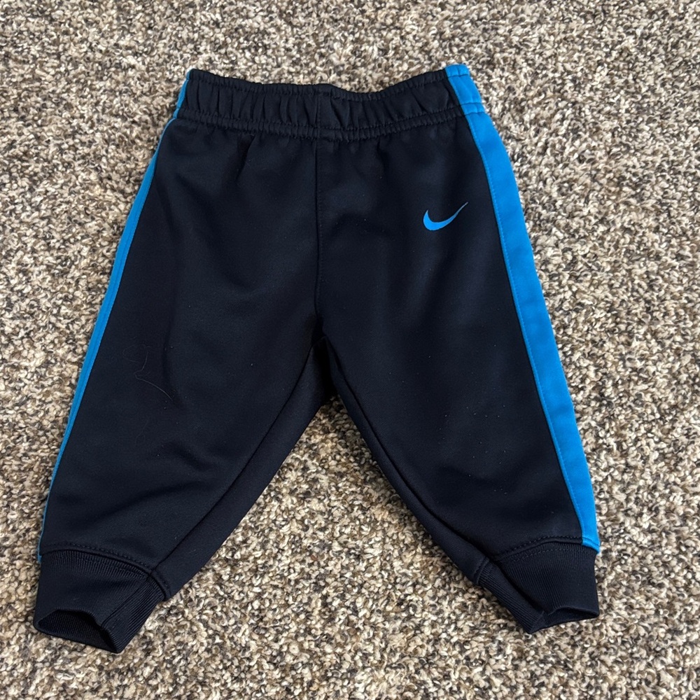 Nike Black Joggers with Bright Blue Side Panels - Kids